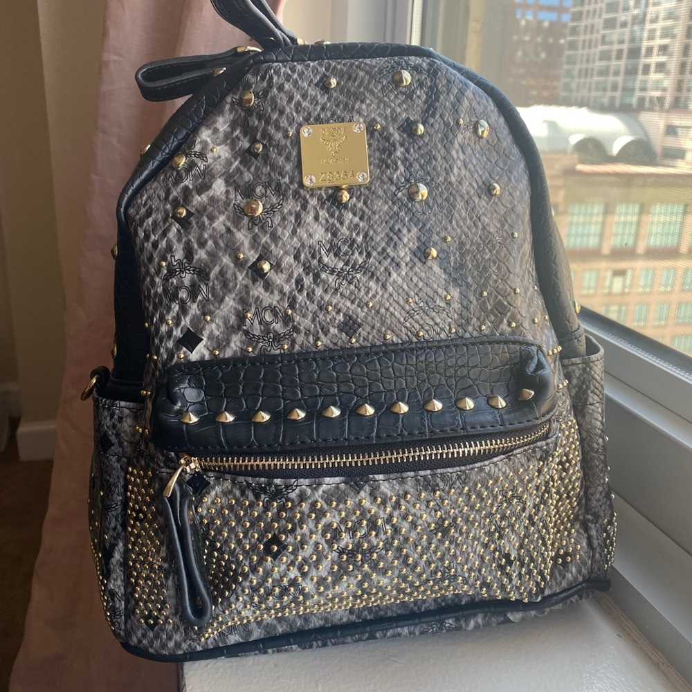 MCM Black and Gold Studded Backpack